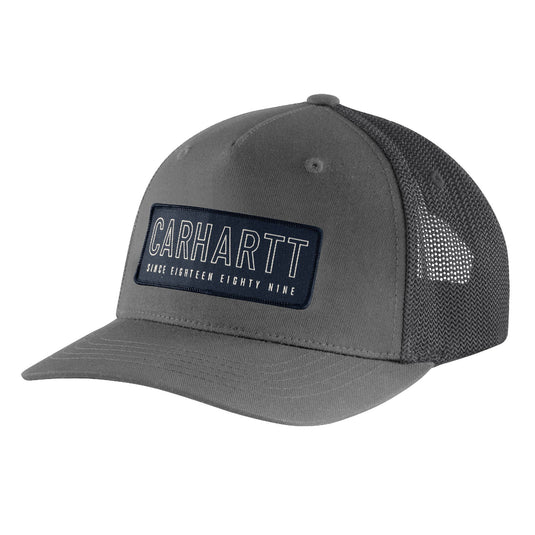 Carhartt Rugged Flex Canvas Mesh-Back trucker grey cap with a Carhartt 1889 (since eighteen eighty nine) patch logo on the front in navy and white.