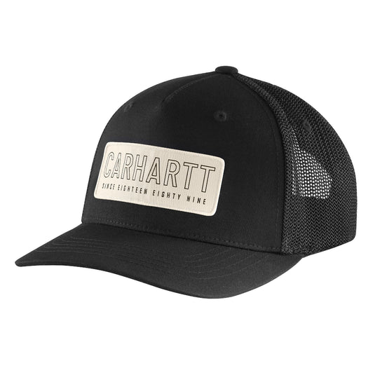 Carhartt Rugged Flex Canvas Mesh-Back trucker cap with a Carhartt 1889 (since eighteen eighty nine) patch logo on the front in black and white.