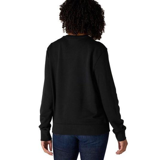 Woman shown from the back wearing a black long-sleeve crewneck sweatshirt and blue jeans against a plain white background.