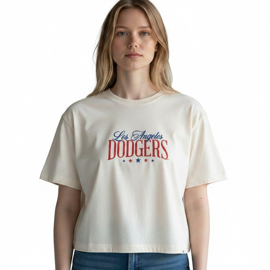 Front view of a women wearing a relaxed fit '47 Brand Los Angeles Dodgers crop top featuring a patriotic Los Angeles Dodgers logo.