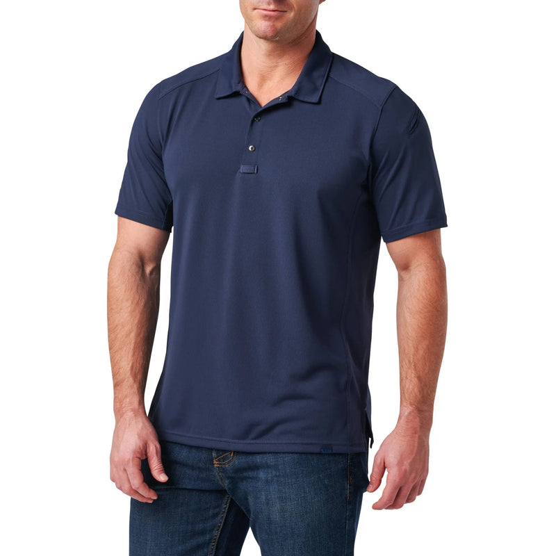 Load image into Gallery viewer, Man wearing a navy blue polyester short sleeve polo shirt on a white background
