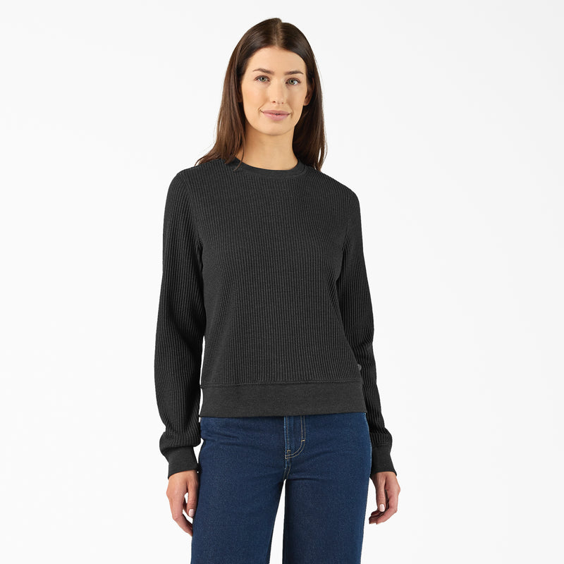 Load image into Gallery viewer, Model is 5' 10" wearing a size small Dickies Women's Thermal Crewneck Shirt - Black Heather - This thermal shirt features a classic waffle knit fabric thermal is perfect for wearing on its own or layered under your favorite Dickies hoodies and jackets.
