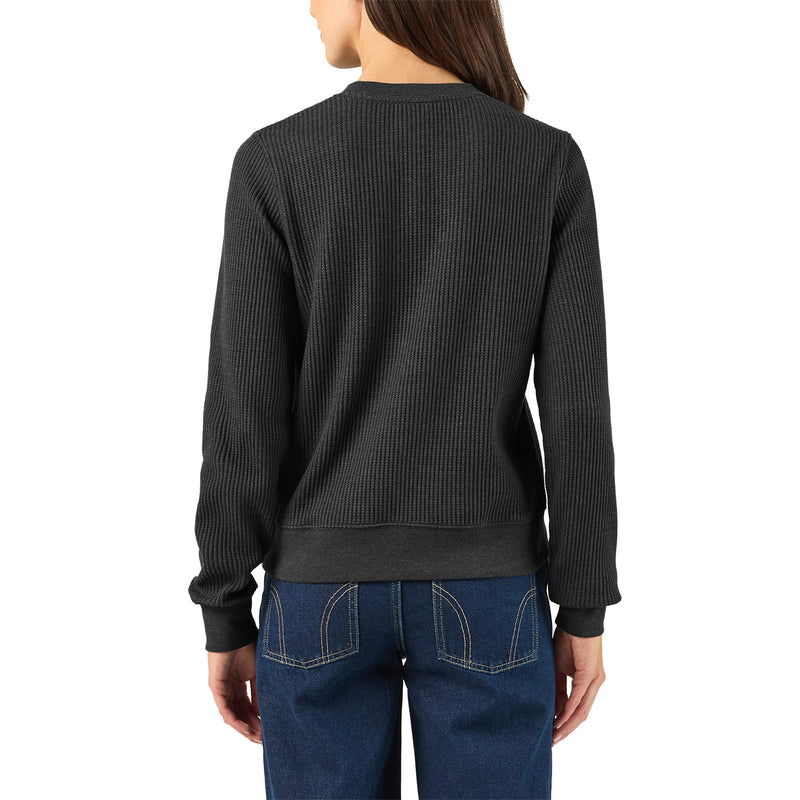 Load image into Gallery viewer, Model is 5' 10" wearing a size small Dickies Women's Thermal Crewneck Shirt - Black Heather - This thermal shirt features a classic waffle knit fabric thermal is perfect for wearing on its own or layered under your favorite Dickies hoodies and jackets.
