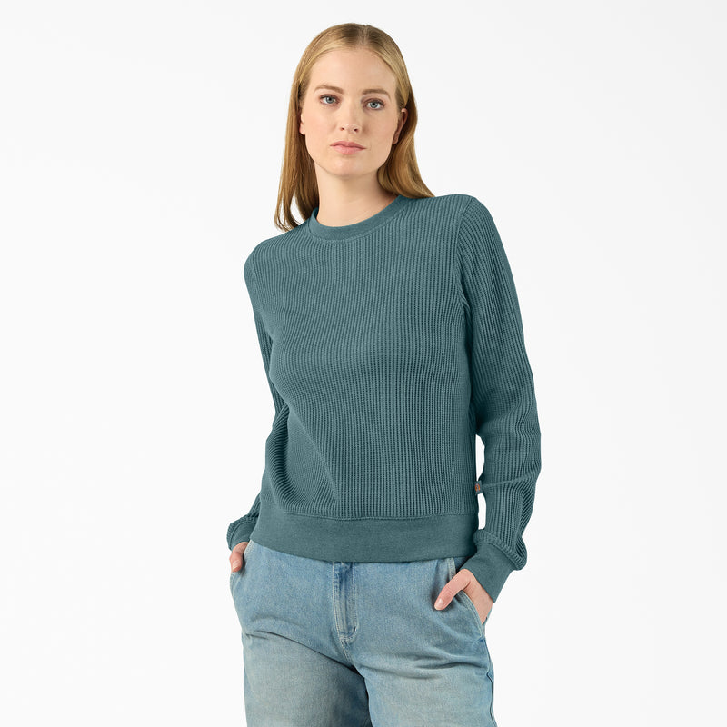 Load image into Gallery viewer, 5' 9" Model wearing a size small Dickies Women's Thermal Crewneck Shirt - Balsam Heather - This balsam fir green women's thermal shirt features a classic waffle knit fabric thermal is perfect for wearing on its own or layered under your favorite Dickies hoodies and jackets.
