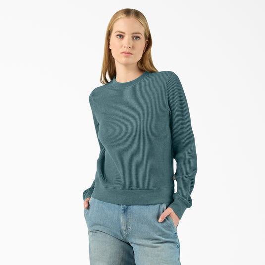 5' 9" Model wearing a size small Dickies Women's Thermal Crewneck Shirt - Balsam Heather - This balsam fir green women's thermal shirt features a classic waffle knit fabric thermal is perfect for wearing on its own or layered under your favorite Dickies hoodies and jackets.