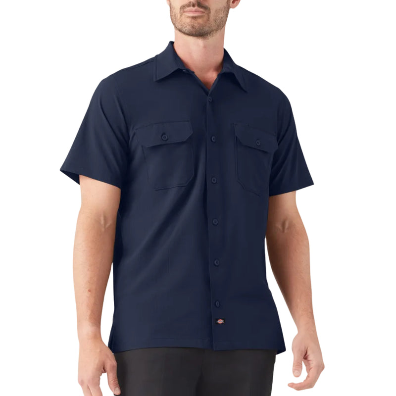 Load image into Gallery viewer, Man wearing a navy short-sleeve shirt on a white background
