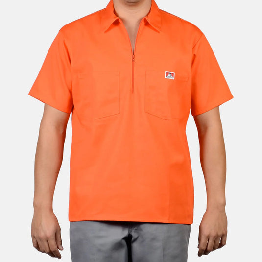 Orange half zip short-sleeve work shirt with a ben davis logo on the left chest pocket 
