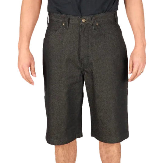Person wearing black Ben Davis denim shorts on a plain background