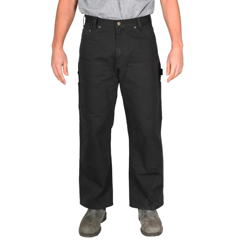 Load image into Gallery viewer, Person wearing black double knee pants with a hammer loop on the left leg on a white background

