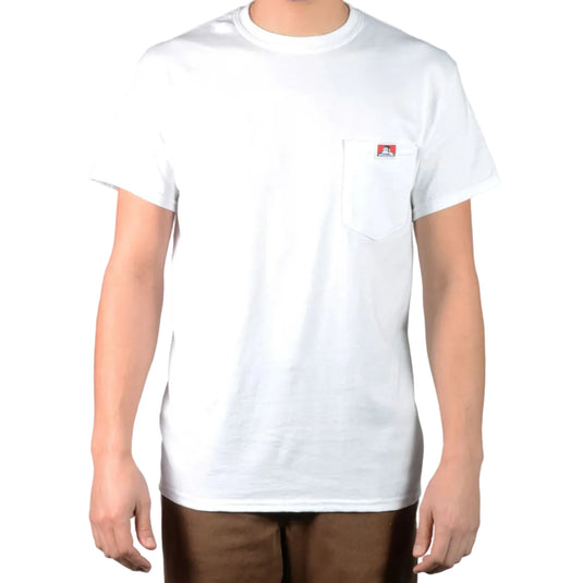 Person wearing a plain white t-shirt with a small logo on the left chest pocket on a white background