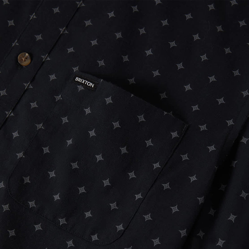 Load image into Gallery viewer, Black short-sleeve button-up woven shirt with subtle grey diamond print and left chest pocket with "Brixton" woven label
