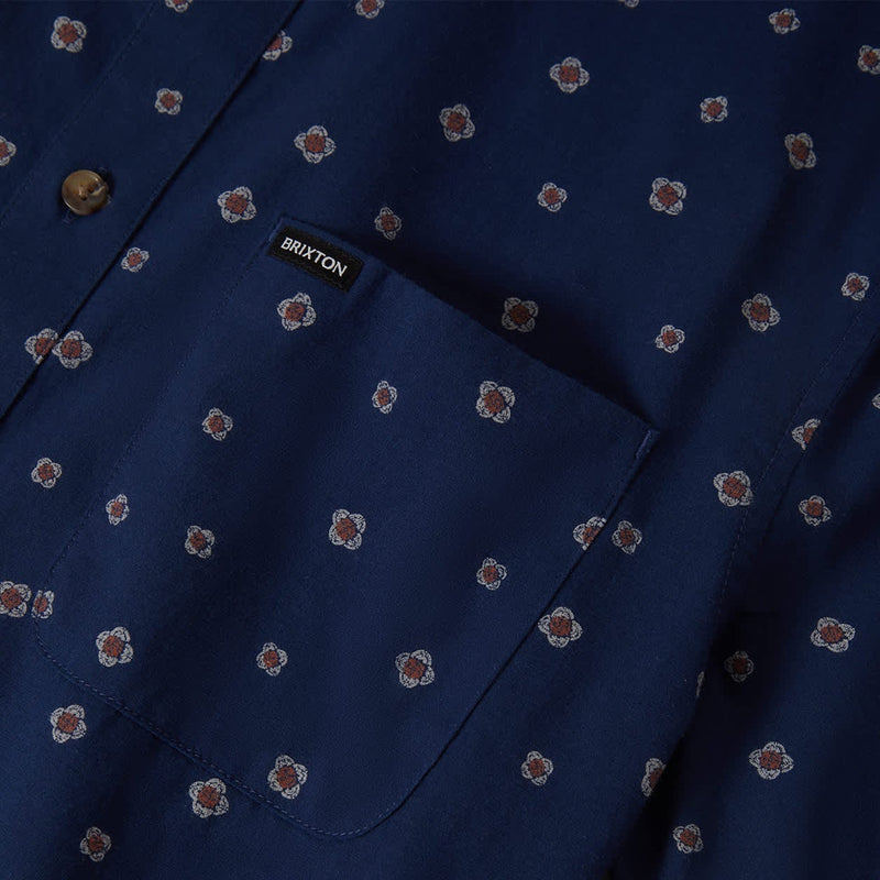 Load image into Gallery viewer, Navy blue shirt with subtle geometric pattern and a left chest pocket with "Brixton" woven label

