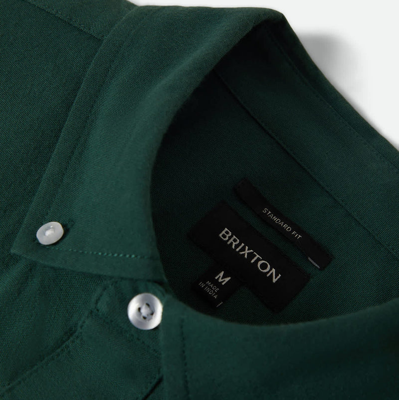 Load image into Gallery viewer, Close-up of a green Brixton Oxford button-down collar and inner woven label

