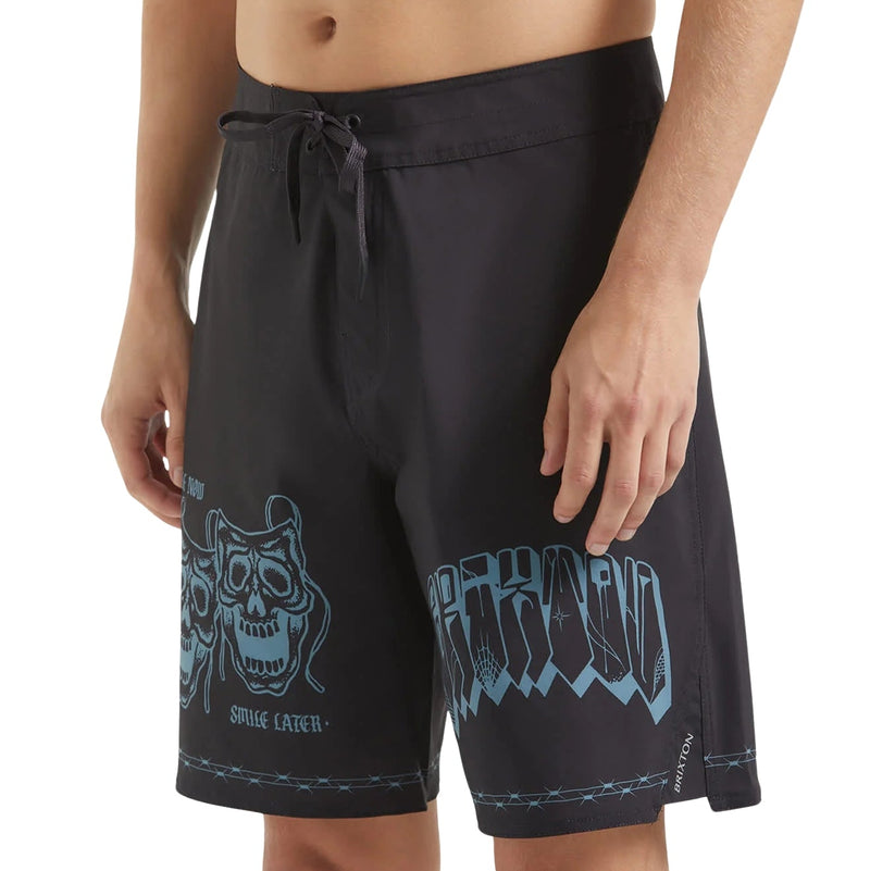 Load image into Gallery viewer, Model is 5'11" and is wearing a size 32 of the black swim shorts 
