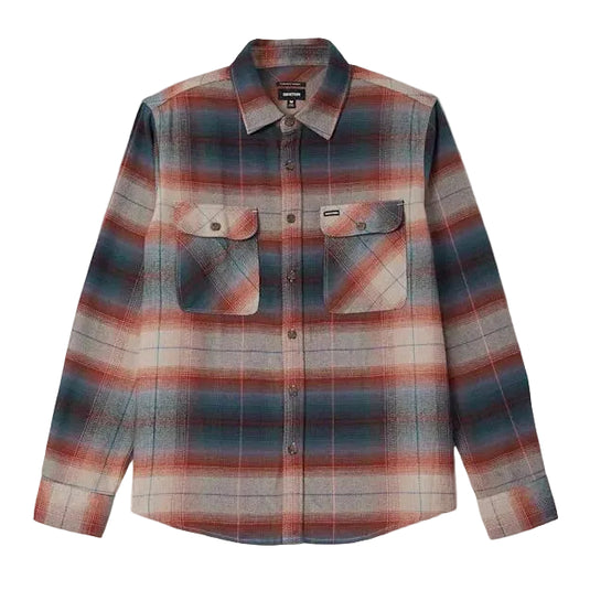 A long-sleeve plaid button-up shirt with two chest pockets, featuring a pattern of muted blue, rust red, and beige. The shirt is displayed flat against a white background.