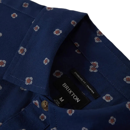 Navy blue shirt with subtle geometric pattern and 