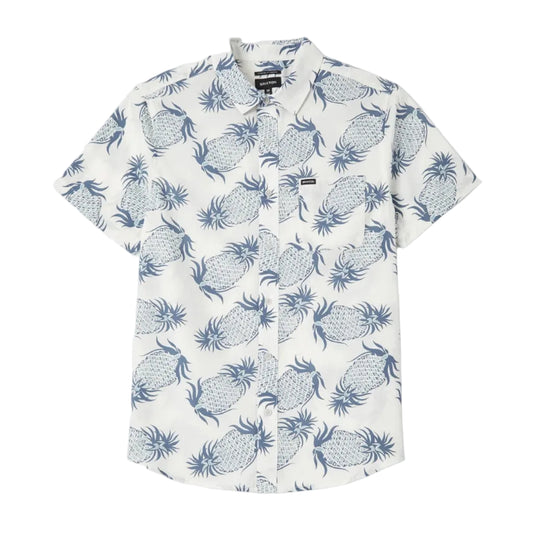 White collared shirt with blue pineapple printed throughout the shirt on a white background