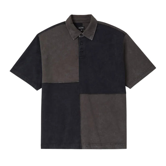 A short-sleeve polo shirt with a color-blocked design in black and dark brown suede-like fabric, shown flat against a light gray background.