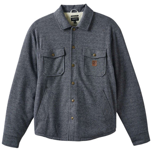 A dark heather gray button-up overshirt jacket with two chest pockets, a collar, and a small brown leather patch on the right chest pocket, shown on a white background.