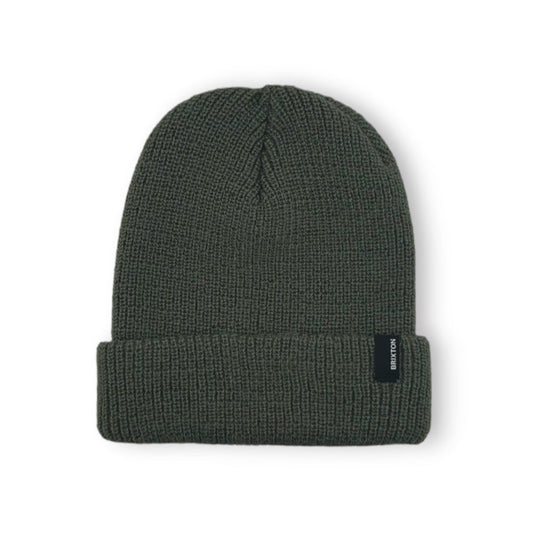 Green beanie with a brand logo on a white background