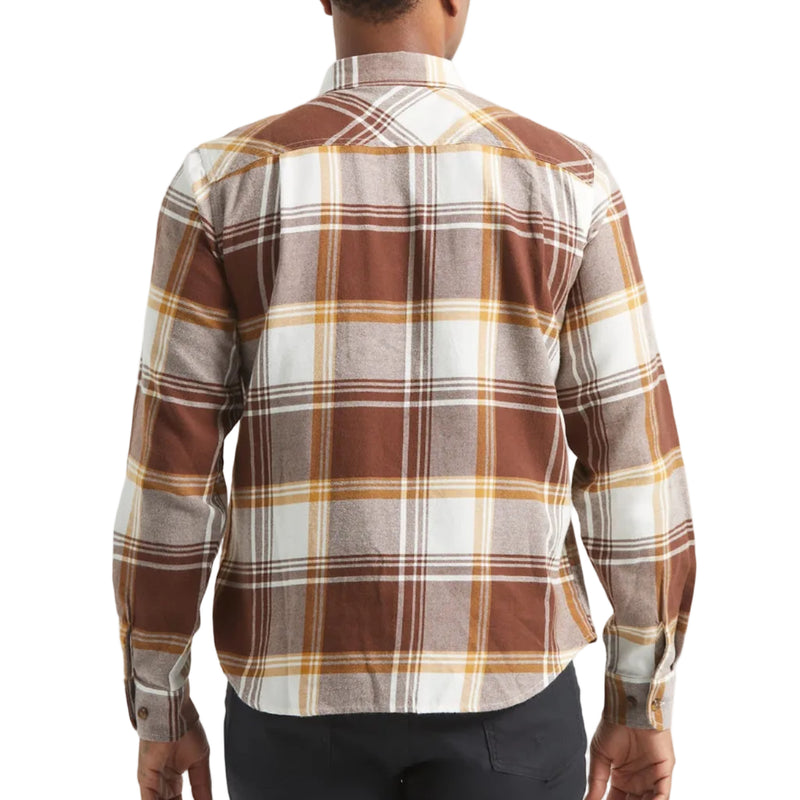 Load image into Gallery viewer, Person wearing a brown and orange laid flannel on a white background. 
