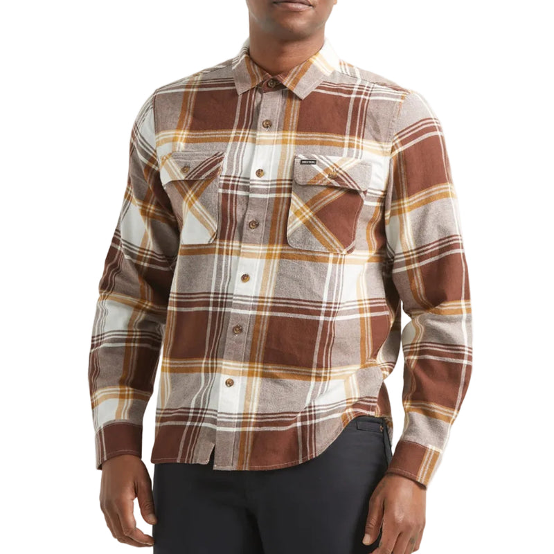 Load image into Gallery viewer, Person wearing a brown and orange laid flannel on a white background. 
