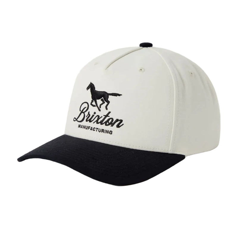 Load image into Gallery viewer, A two-tone baseball cap with an off-white crown and a black curved brim. The front features a black embroidered horse logo and the text 'Brixton Manufacturing'.
