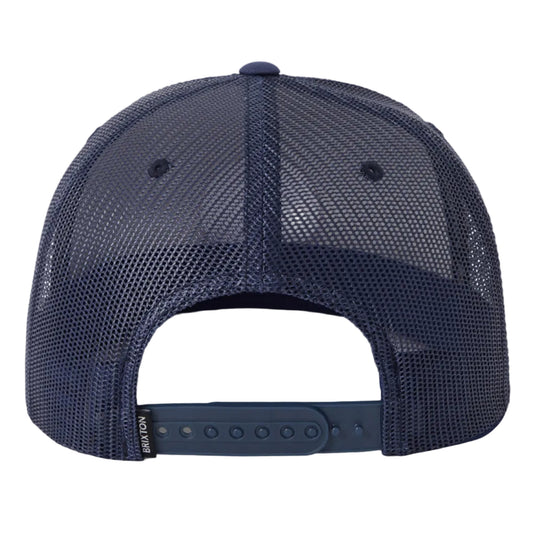 A navy blue mesh back baseball cap shown from the back, featuring a dark navy adjustable strap with a plastic button closure on a light gray background.