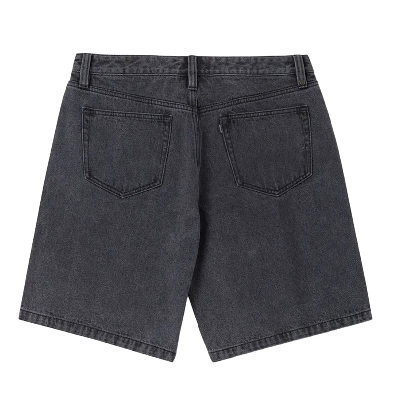 Load image into Gallery viewer, Dark gray washed denim shorts shown from the back, featuring two large patch pockets and a button closure, on a light gray background.
