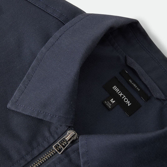 Closeup of a Dark navy Brixton Jacket neckline and collar