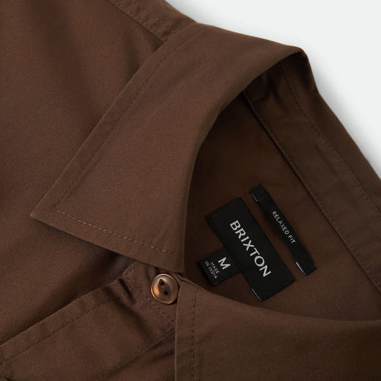 Closeup of the neckline and collar of a Dark brown Brixton shirt