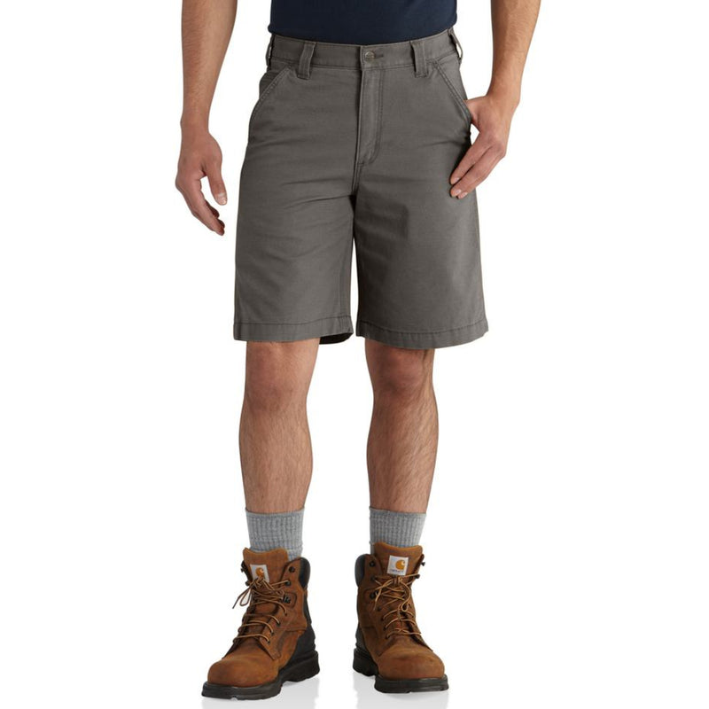 Load image into Gallery viewer, Person wearing gray Carhartt shorts on a white background
