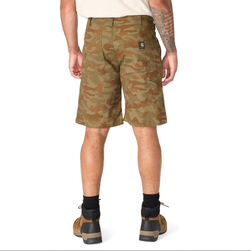 Load image into Gallery viewer, Male wearing Army Green Camouflage shorts on a white background with Carhartt logo on the back right pocket
