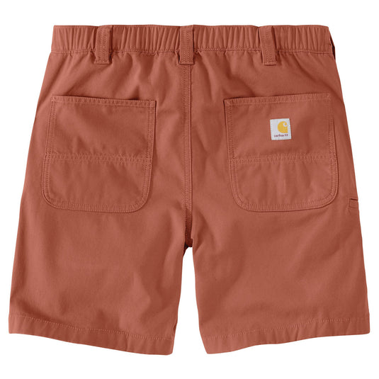 Rust-colored Carhartt work shorts shown from the back, featuring two large patch pockets and the signature Carhartt logo patch on the right pocket.