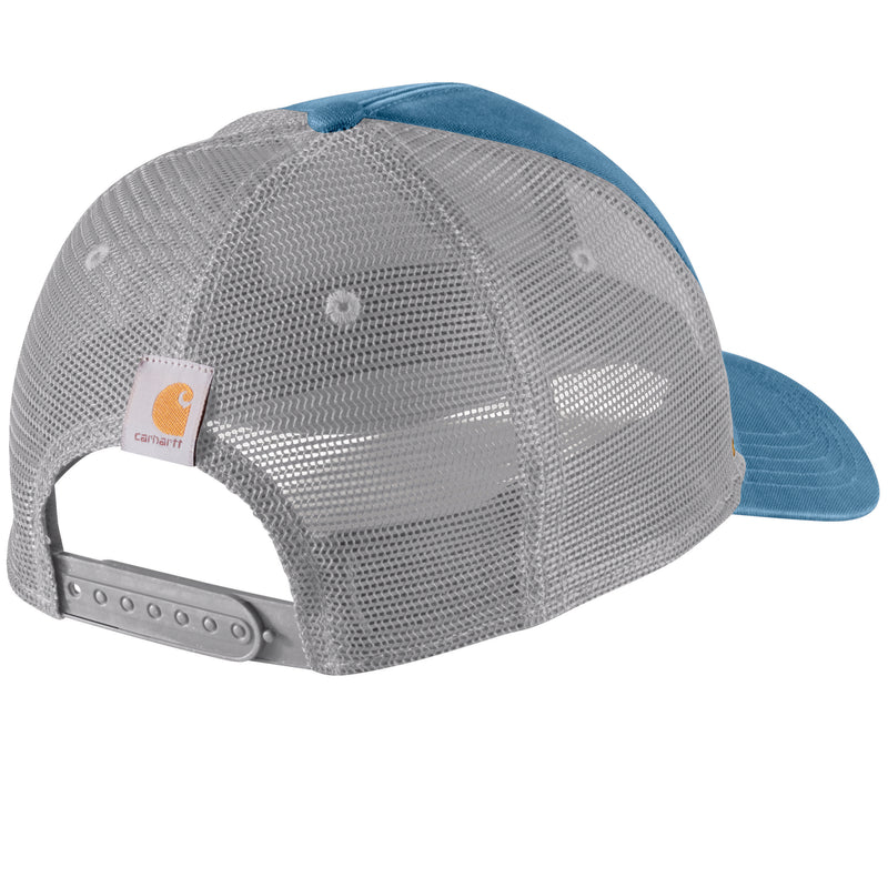 Load image into Gallery viewer, Rear three-quarter view of a Carhartt trucker cap with a gray mesh back, blue visor, and blue crown top, on a white background.
