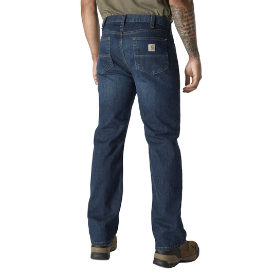 Person wearing blue jeans on a white background