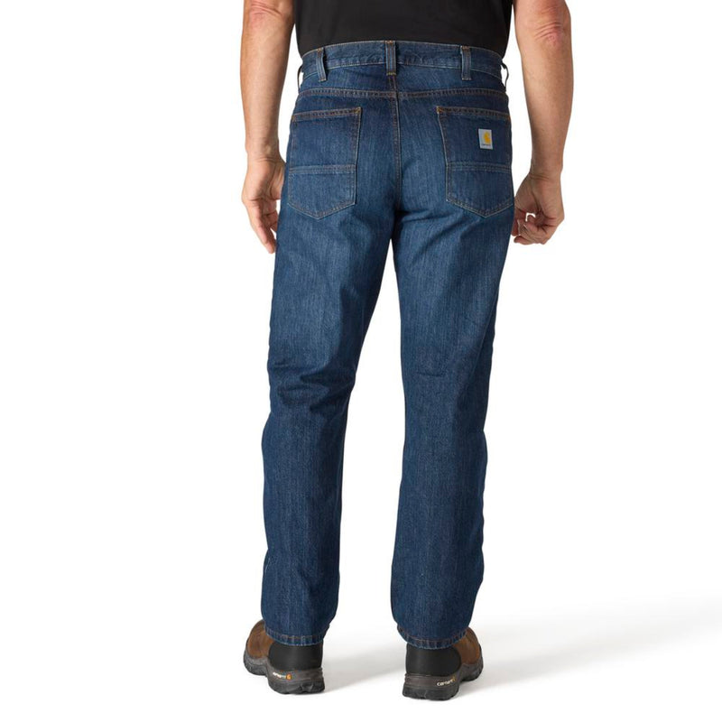 Load image into Gallery viewer, Blue jeans worn by a person on a white background
