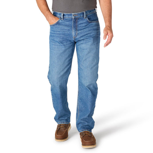 Person wearing blue jeans on a white background