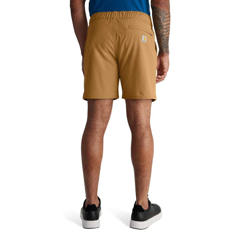 Load image into Gallery viewer, Person wearing tan shorts on a white background

