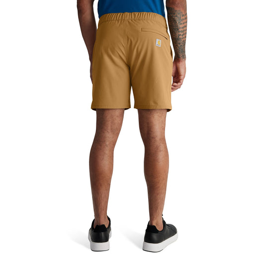 Person wearing tan shorts on a white background