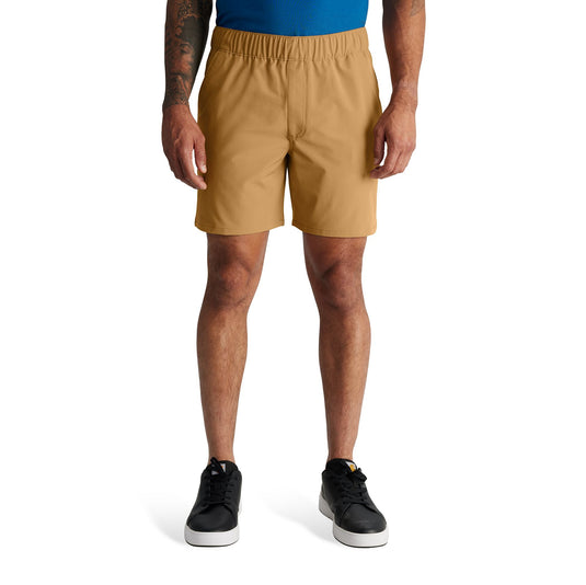 Person wearing tan shorts on a white background