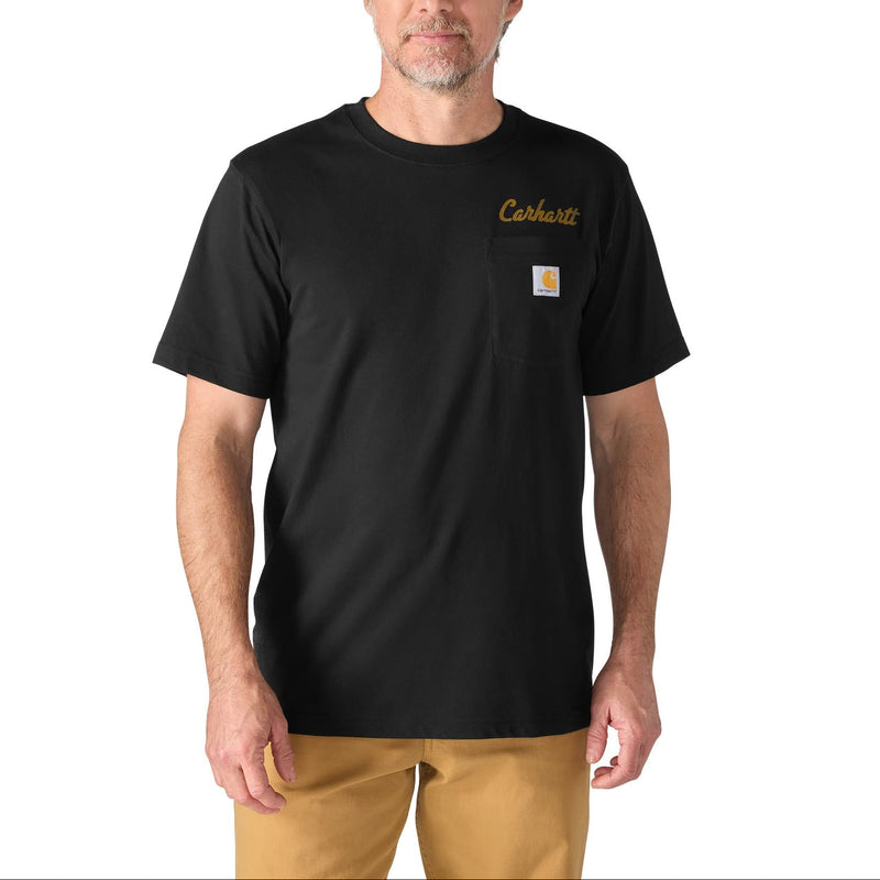 Load image into Gallery viewer, A man wearing a black Carhartt short-sleeve work shirt with a chest pocket, featuring a gold script logo and the brand's signature square patch on the left chest, paired with tan pants against a plain white background.

