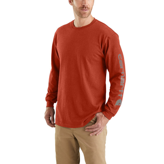 Man wearing a red long-sleeve shirt with a visible carhartt brand logo along the sleeve on a white background