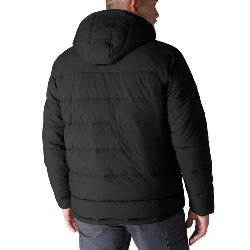 Load image into Gallery viewer, Man wearing a black puffer jacket on a light gray background
