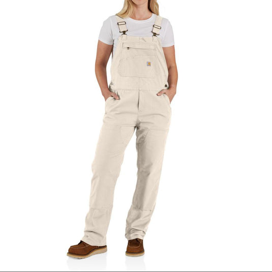 Woman wearing off-white Carhartt overalls on a white background