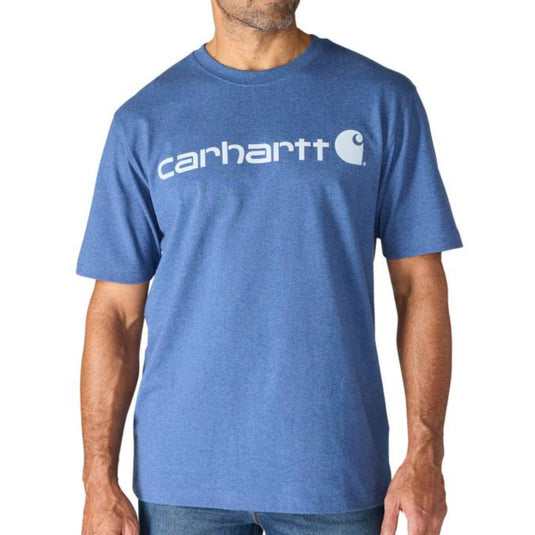 Man wearing a blue Carhartt t-shirt on a white background