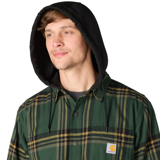 Closeup of a man wearing the hood of a Carhartt Plaid Shirt Jac