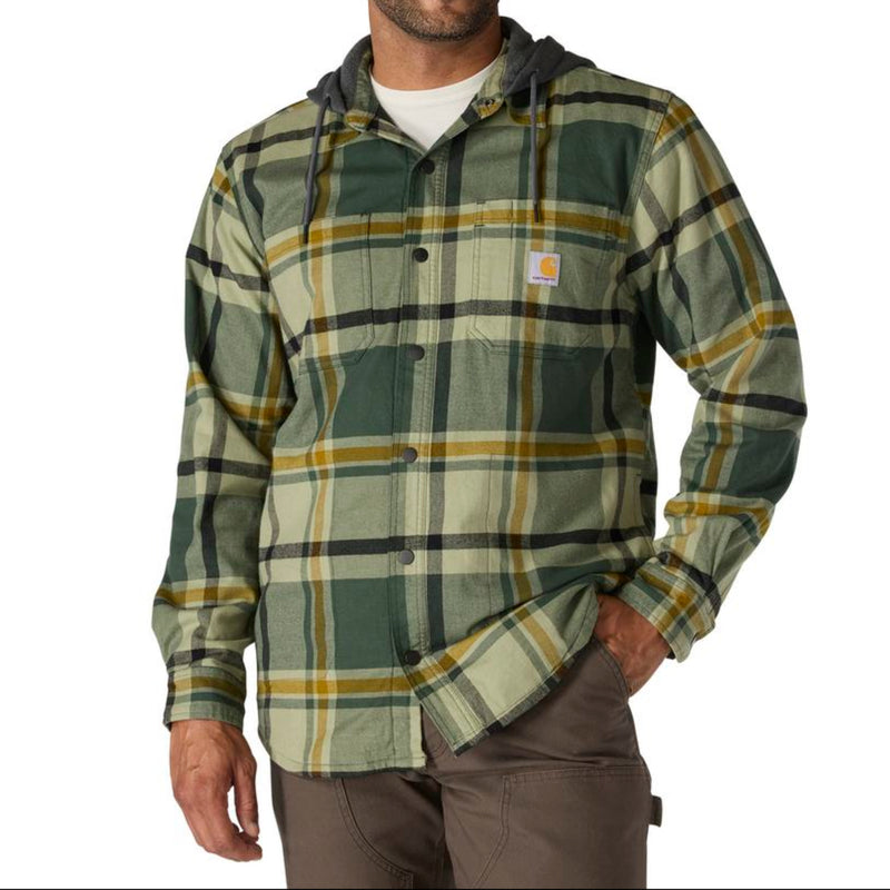Load image into Gallery viewer, Man wearing a forestry green plaid shirt with a visible Carhartt brand logo on the left chest pocket on a white background
