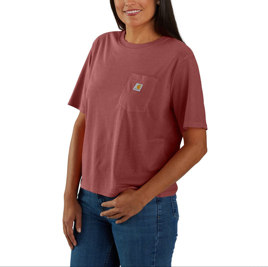 Woman wearing a maroon t-shirt with a pocket on a white background