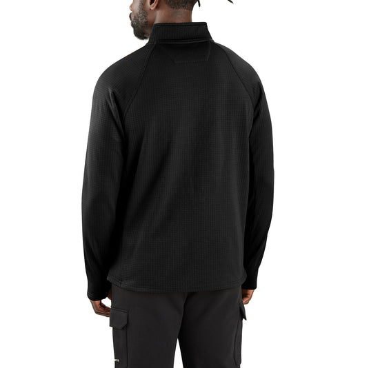 Person wearing a black quarter-zip sweatshirt and cargo pants on a white background